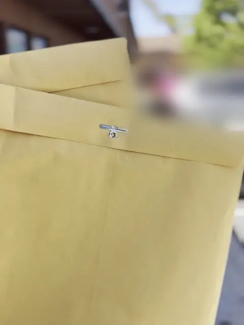 Legal envelopes outside a business for a Riverside County case